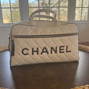 CHANEL White Quilted Leather Holdall with Black Logo and Trim